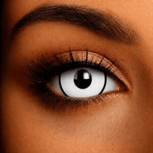 Close-up of a brown eye wearing white mini sclera contact lenses, featuring a solid white iris with a bold black limbal ring for a dramatic costume effect.