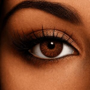 Close-up of an eye wearing Hazel Glamour Contact Lenses, featuring a warm hazel-brown blend with subtle golden tones.